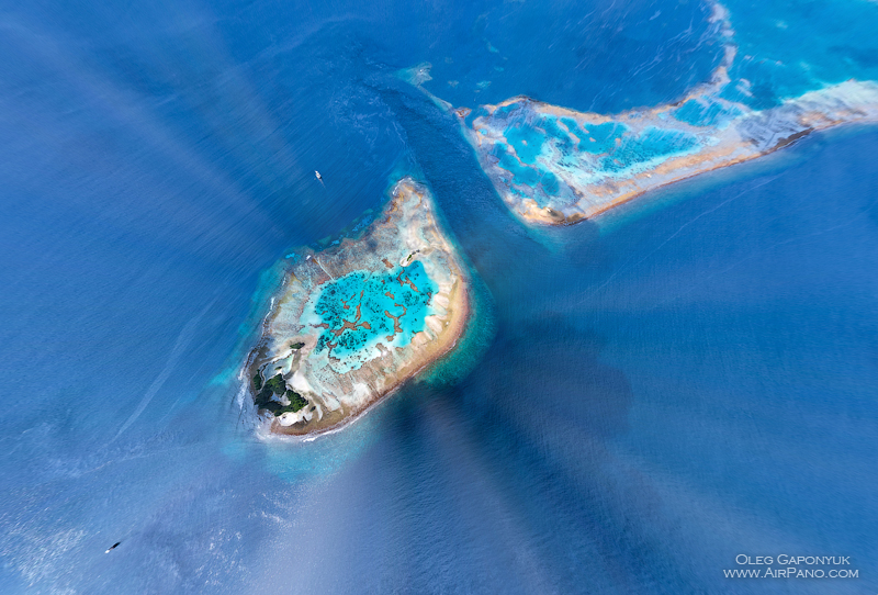 Southern Maldives. Over the coral reef