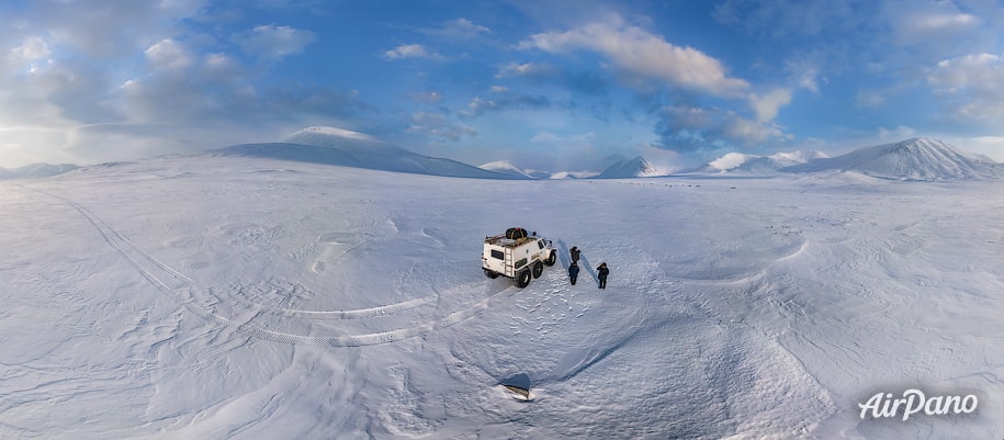 All-terrain vehicle on the frozen river