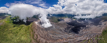 Low clouds and the smoke of the volcano