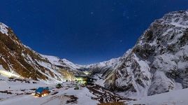 Starry sky over mount Elbrus. Mountain hotel 