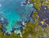 Above the southern coast of Isabela Island