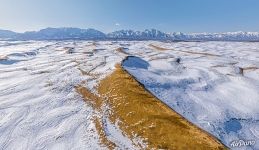 Snow on a dune in early spring