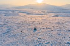 All terrain vehicle on the frozen river #7